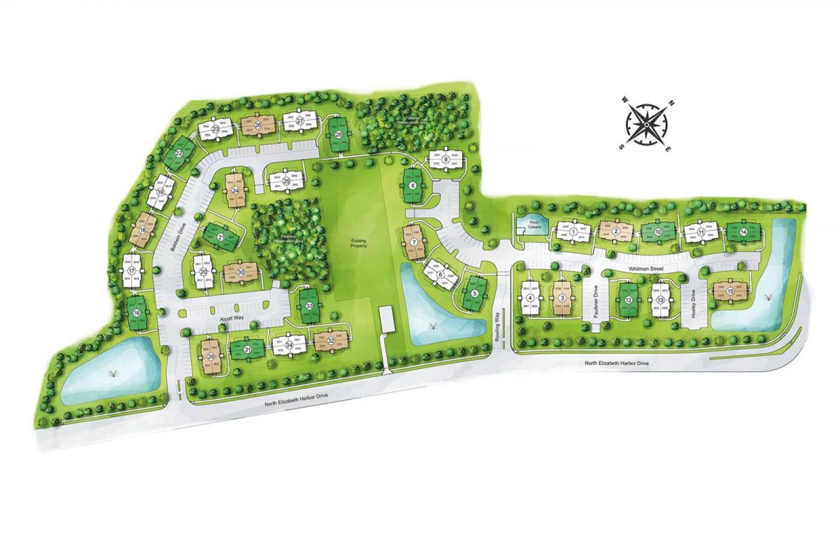 Colored site plan of a residential development with green spaces, ponds and streets