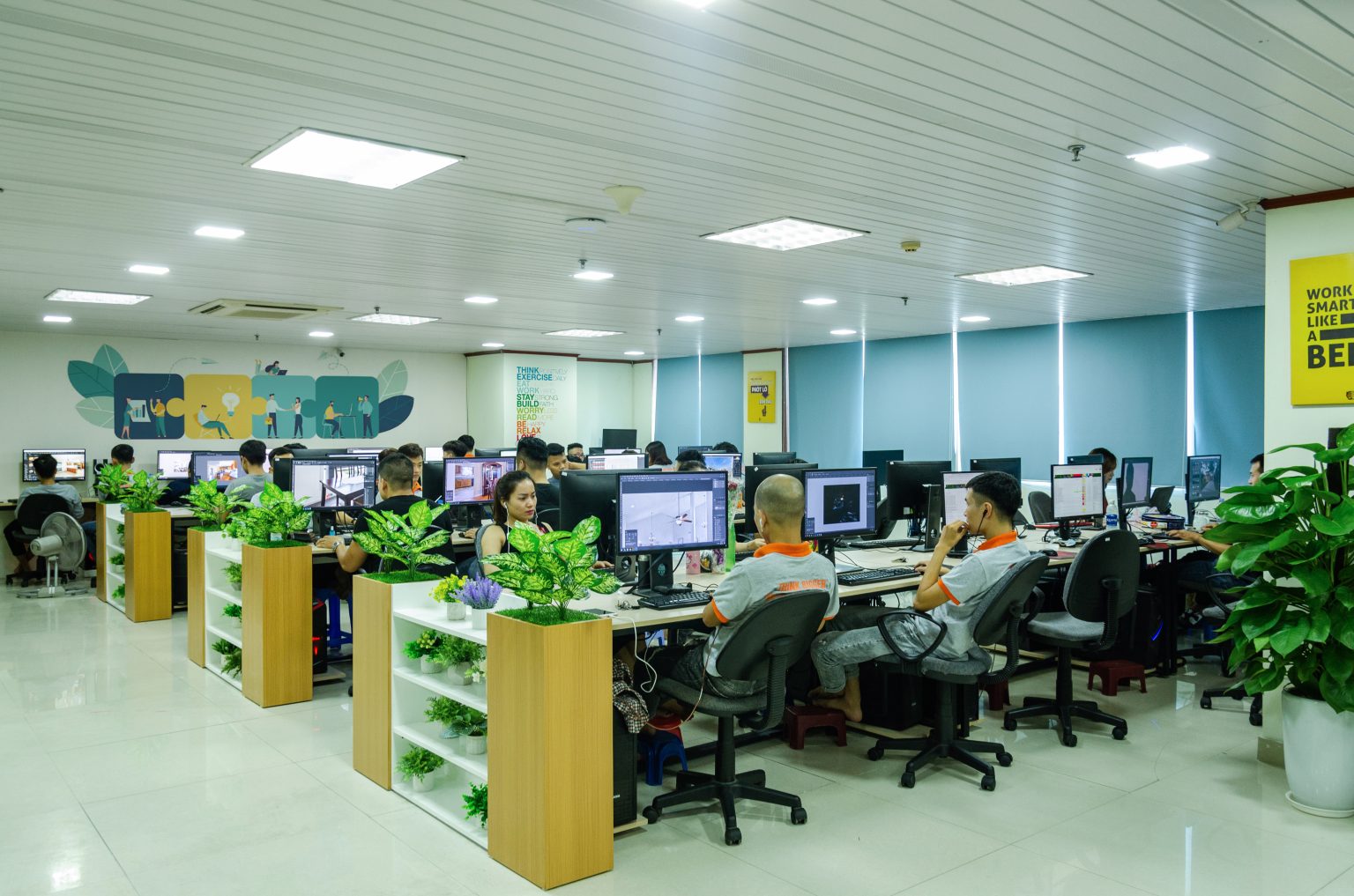 Beepec editors at their workstations in the Hanoi office