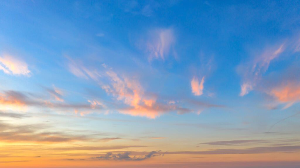 Sunset sky with orange and pink clouds