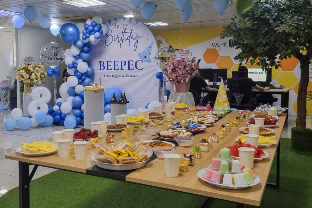Birthday party table set up in the office for Beepec’s 8th anniversary